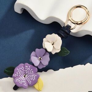 Floral Keychain with Purple and White Accents